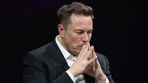 Should Elon Musk step down from Tesla?